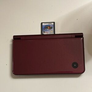 Red Nintendo DSi XL with Super Mario Game